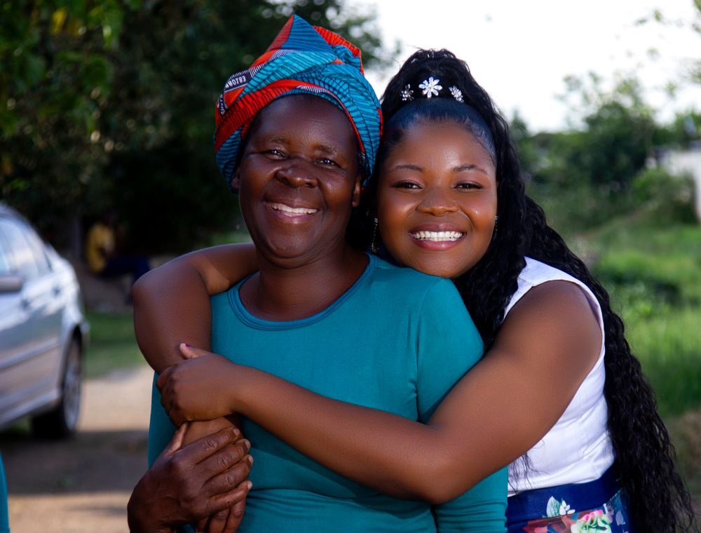 Two women embracing with joy