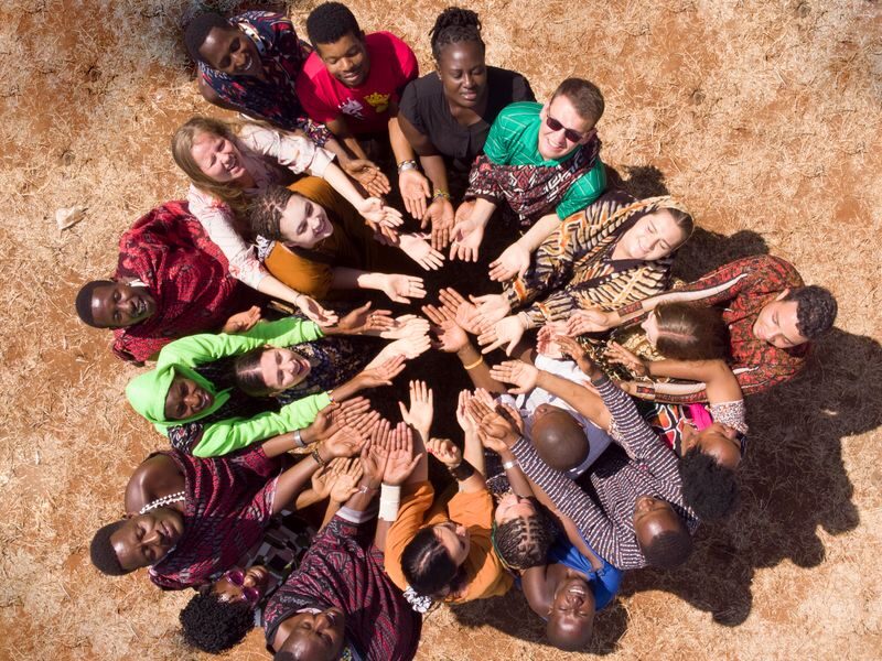 Children joining hands in a circle